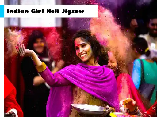 Game: Chica india jugando al rompecabezas de Holi.